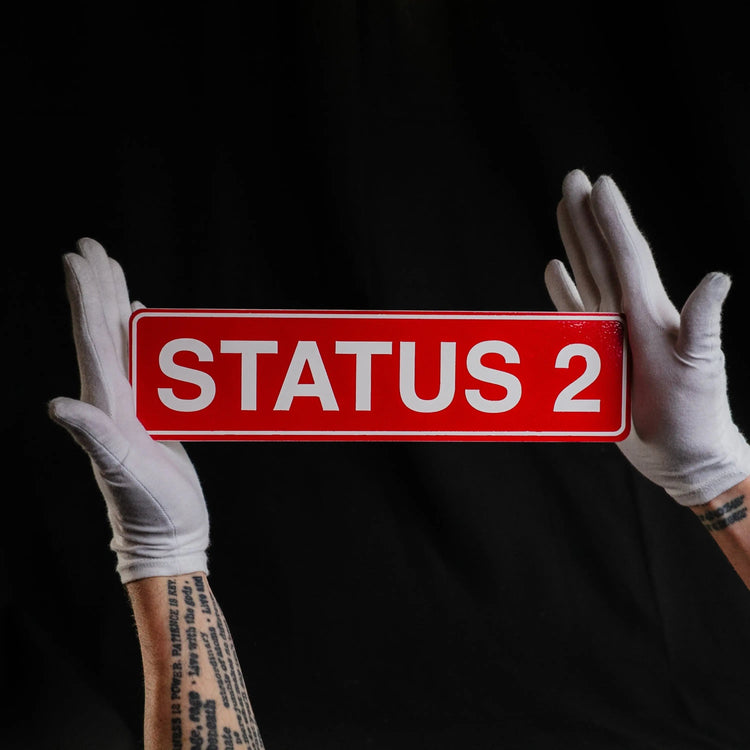 Status 2 Schild